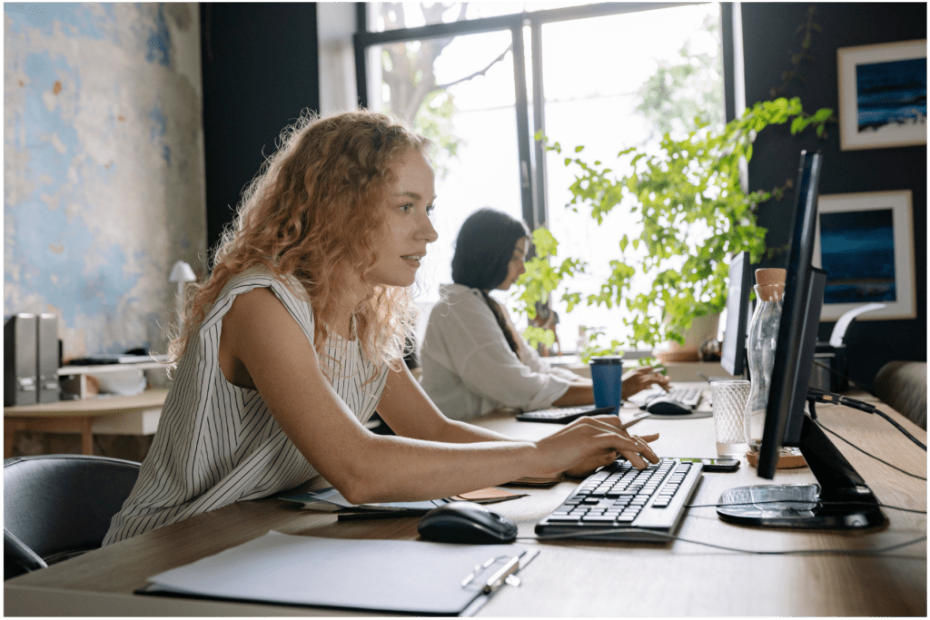 Fundraiser writing a donation request letter